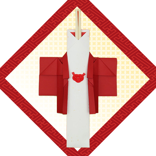 購入特典の赤いちゃんちゃんこを着た祝い箸